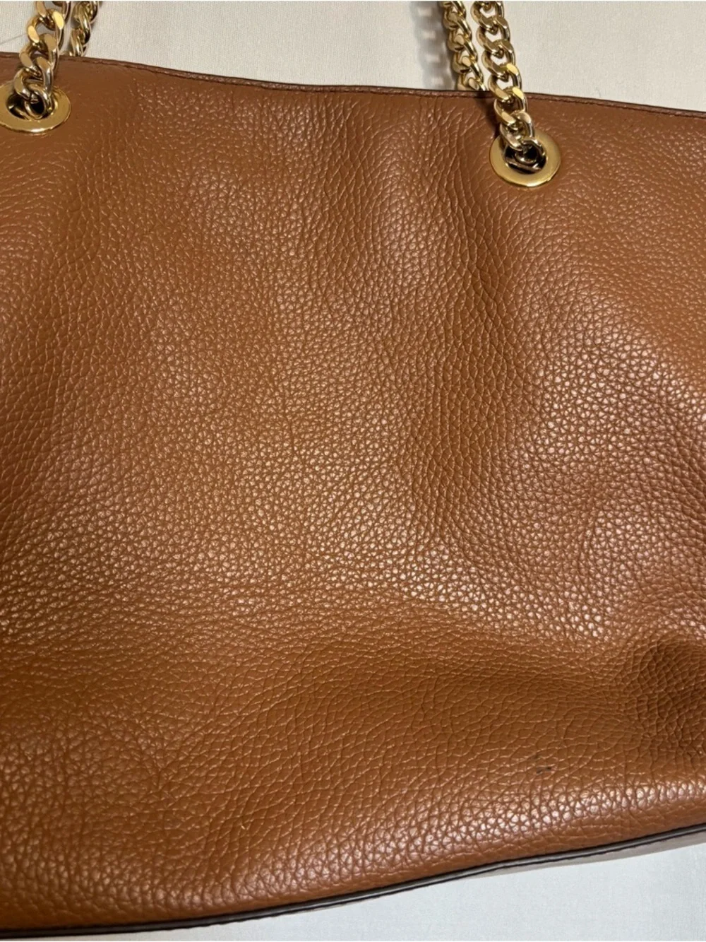 Michael Kors Cognac Pebbled Leather Tote with Gold Chain Straps zipper closure